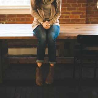 woman sitting alone