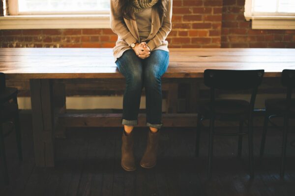 woman sitting alone